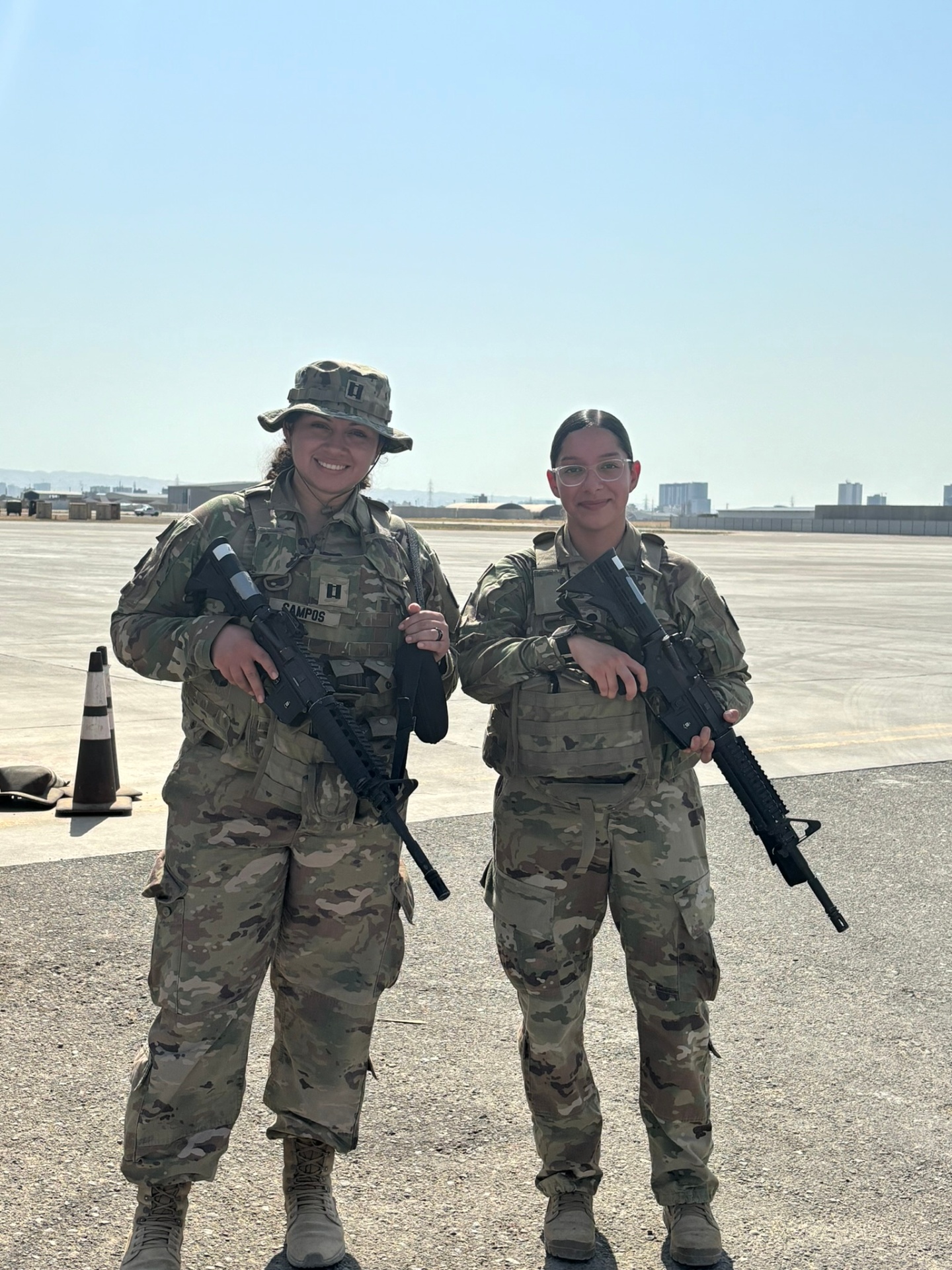 Tania Figueroa (right), Co-Founder & COO of The Divine Cleaners, U.S. Army Combat Veteran, deployed overseas